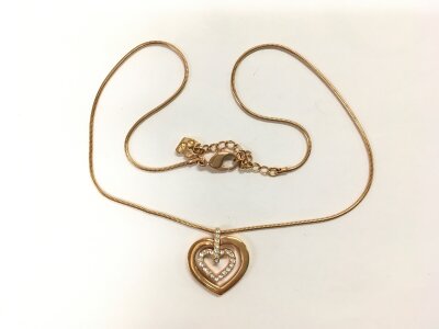 A Swarovski necklace and pendant.