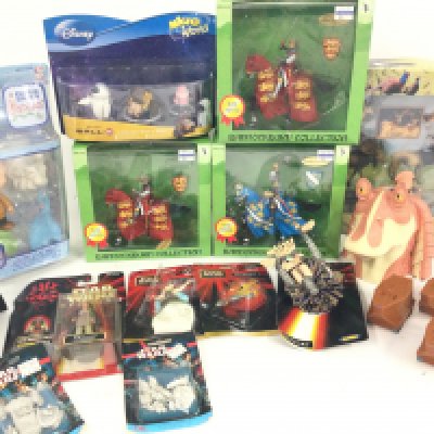 A Collection of Carded and Loose Star Wars Items And Other Boxed Toys.
