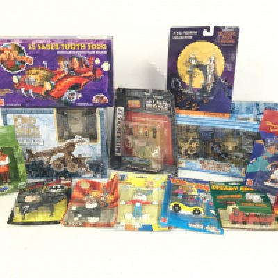 A Collection of Various Carded and Boxed Toys including Micro machines. Disney. The Lord of the rings. Etc.
