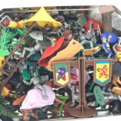 A Tin Containing plastic Knights Includes Timpo and Britains. No Reserve.