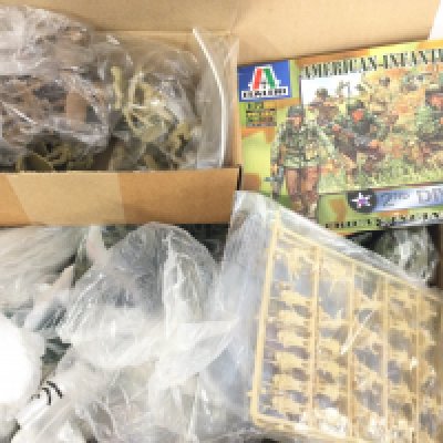 A Box Containing a Large Collection of small Plastic Model Kit Soldiers.