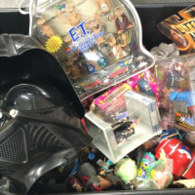 A Box Containing Various Toys. Figures. Including Disney. Star Wars. E.T. Etc.