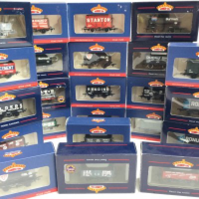 A Case Containing Boxed 00 Gauge Bachmann Wagons. Track and transformers.