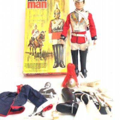 A Boxed Vintage palitoy Action Man The Life Guards Dressed Figure with another Uniform.