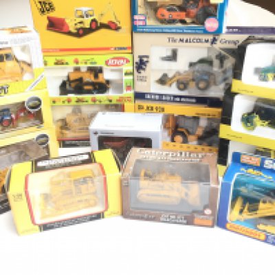 A Collection of Boxed Diecast Construction Vehicles including Corgi. Joal. Matchbox etc.