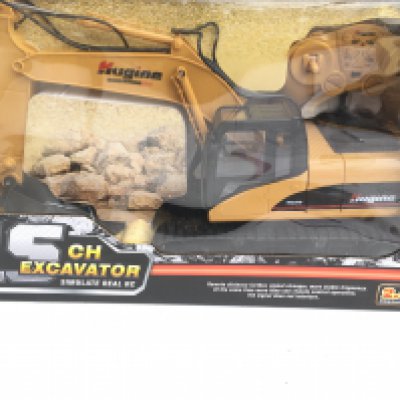 A Boxed Hugine Toys 15 ChannelRemote Controlled Excavator.