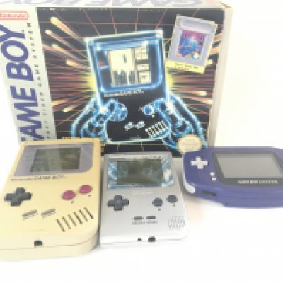 A Box Containing Various Video Games including game Boys.