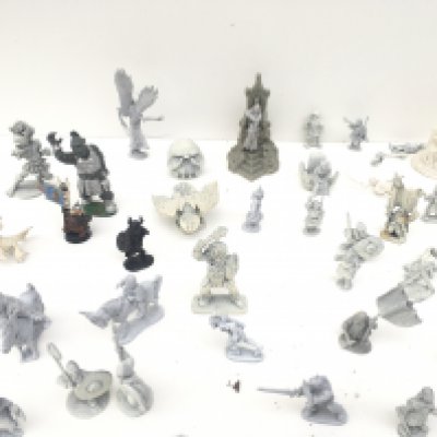 A collection in excess of 60 pieces of Warhammer metal figures mainly unpainted.