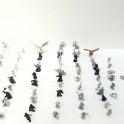 A collection in excess of 60 metal figures and additional accessories from Warhammer . Mostly unpainted.