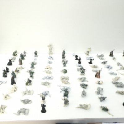 A collection in excess of 90 metal Warhammer figures mostly unpainted.
