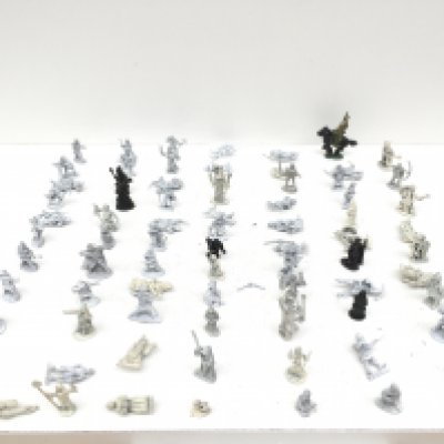 A group in excess of 70 metal figures from a Warhammer collection mostly unpainted.