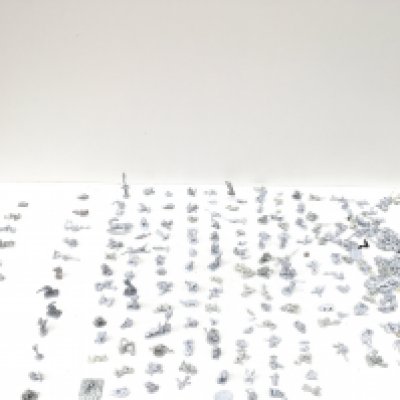 A group of approximately 180 metal figures and accessories from a Warhammer collection all are unpainted.