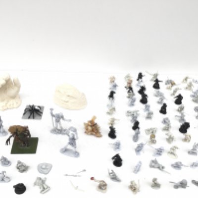 A group of approximately 100 mainly metal figures from a Warhammer collection generally unpainted.