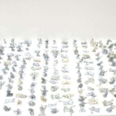 A box containing in excess of 160 metal figures from a Warhammer collection all unpainted