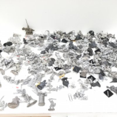 A box containing approximately 120 metal figures and accessories by Grenadier..GAA and others from a Warhammer collection unpainted.