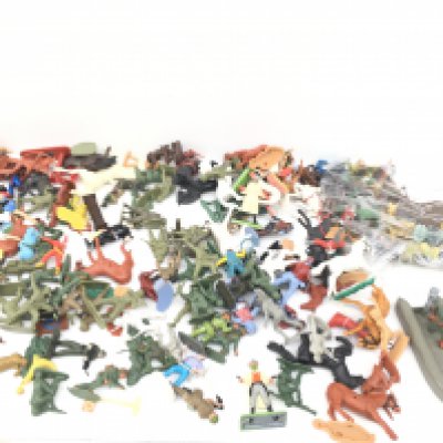 A collection of assorted plastic toy figures in various themes..soldiers..Indians..cowboys..animals etc. made by Timpo..Britains and others.