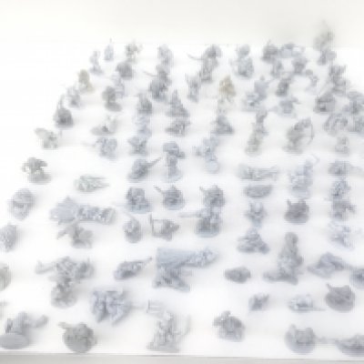 A box containing in excess of 100 unpainted metal figures from a Warhammer collection. Made by Ral PARTHA ..Grenadier and others.