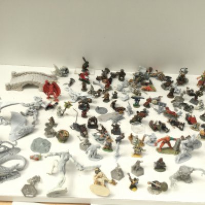A box containing approximately 100 metal figures and accessories from a warhammer collection. Mostly painted. Made by Grenadier and others