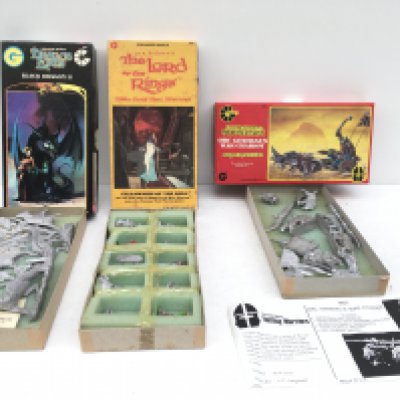 Three boxed sets by Grenadier models. DRAGON LORDS BLACK DRAGON II..LORD OF THE RINGS. Part painted...ORC GENERALS WAR CHARIOT.