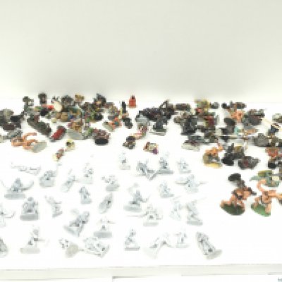 A box containing in excess of 100 mainly painted metal figures from a warhammer collection. Made by Grenadier and others