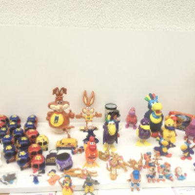 A collection of approximately 50 figures and cars made to be promotional items, mostly for Cadbury but some Nesquik and Kellogg