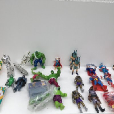 A collection in excess of 30 pieces of super hero related figures and accessories by Hasbro..Kenner and others.