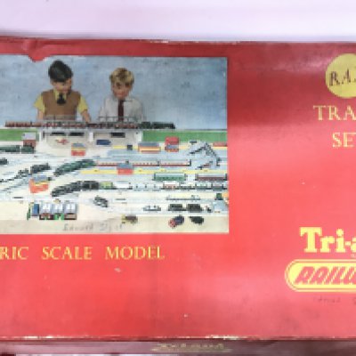 A Case containing boxed 00 Gauge Tri-Ang. Including set RAX.