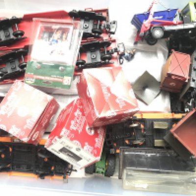 A Box Containing a Collection of G Gauge wagons And Coaches.