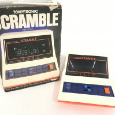 A Boxed Tomytronic Battery Operated Scramble Game.