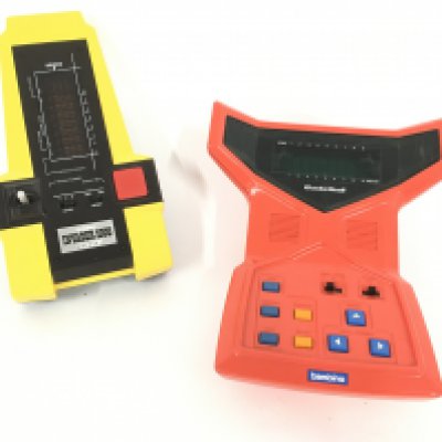 A Gakken Invader 100 Hand Held Game And a Bambino Basketball Hand Held Game.