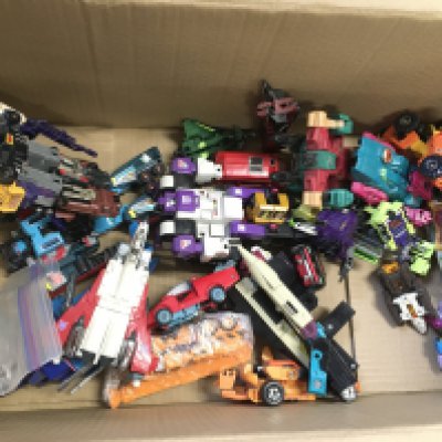 A Box Containing Loose G1 Transformers Etc.