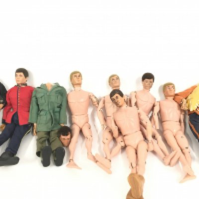 A Collection of Vintage Action Man with Uniforms and Accessories. Ideal for spare Parts Etc.