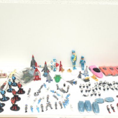 A collection in excess of 100 pieces from Thunderbirds and Captain Scarlet. Comprising vehicles..characters etc.