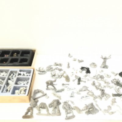A group of metal figures from a warhammer collection mostly unpainted by Ral Partha..Grenadier and others