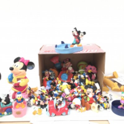A large box containing Disney characters and vehicles.