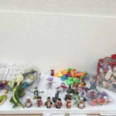 A large collection of model figure reflecting..the wombles..scooby doo..snoopy and others.