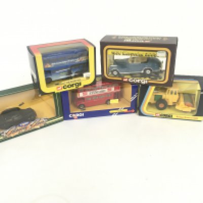 A collection of 5x boxed Corgi diecast model vehicles including buses and roller NO RESERVE