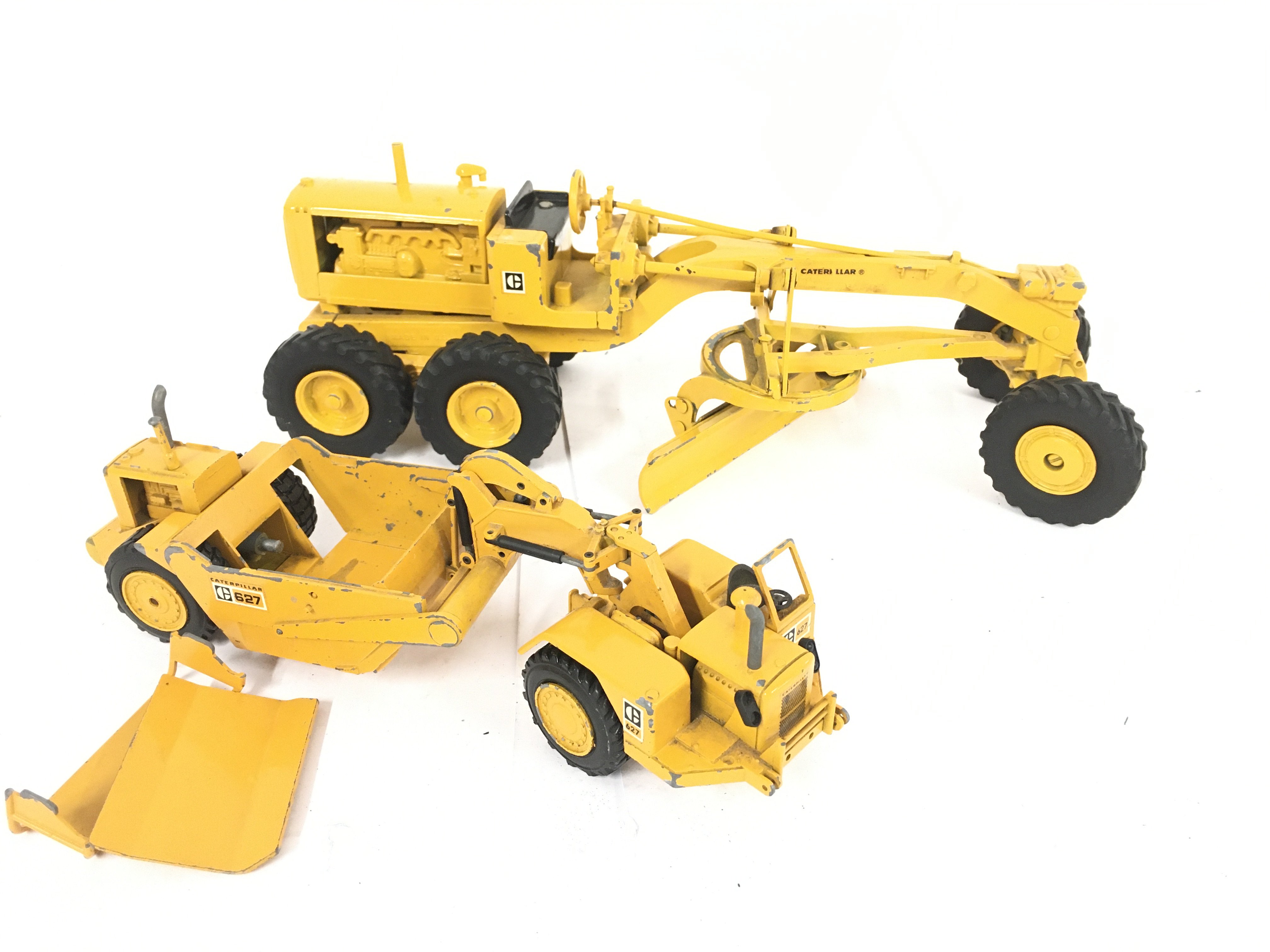 2 Die-Cast Construction vehicles. A NZG Cat 627 Scrapper and a Track Excavator.