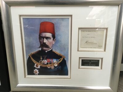 A framed display of the autograph of Lord Kitchener ,frame dimensions 50x43cm