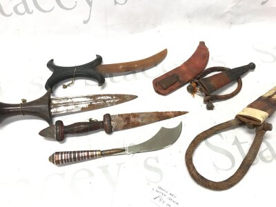 Four knives, primarily of African and Philippine origin, also including a "Trench art" letter opener- NO RESERVE