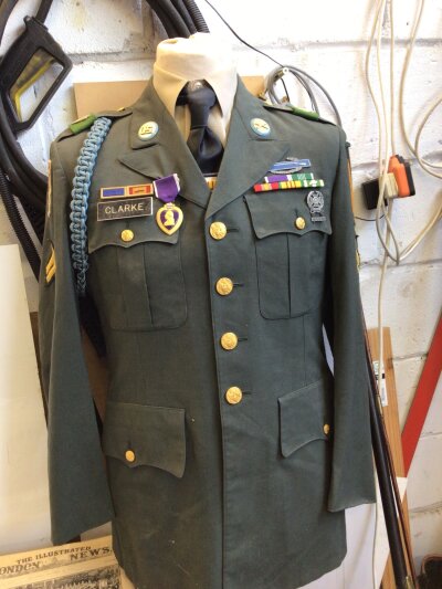 Modern War History An American Class A dress jacket corporal Clarke of the 2nd Field Force Vietnam.
Well decorated and with a Purple Heart. The 2nd Field force saw much battlefield action during 1966 against the VC.