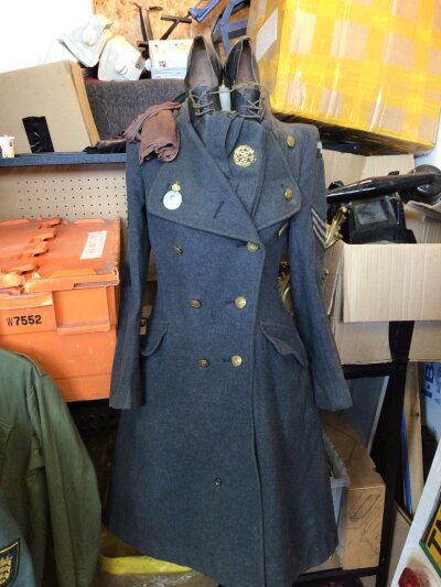 A II world war ladies RAF sergeants uniform with shoes and medal ribbon.
