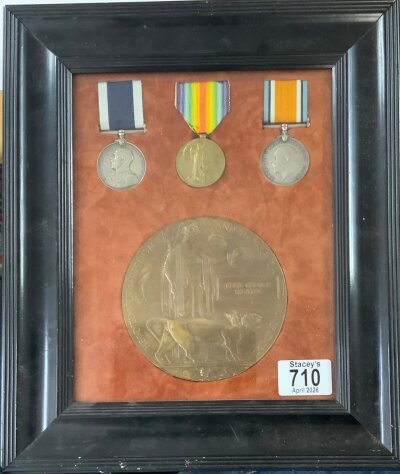 A framed WW1 Medal group and Death plaque, awarded to Cecil George Skeates, C. Skeates,  STO PO HMS QUEEN, Long service medal, Victory and War medals. 295757