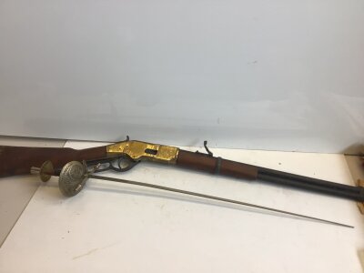 A non firing Replica Winchester type  Unser leaver rifle and a modern short ornamental fencing foil (2)