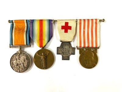 A. Mounted WW1 British war medal inscribed M.F.B.H.A Robertson, together with two French Commemorative medals of the War of 1914 - 1918, French S.B.M. - Secours aux Blesses Militaires (S.B.M. = Relief to Wounded Soldiers).