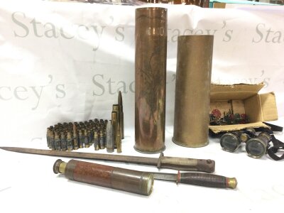 Two shell cases including a trench art shell case, a knife , bayonet, binoculars, telescope, bullet shells
