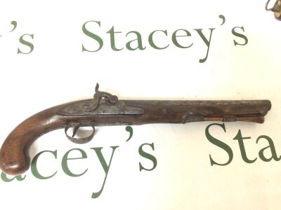 A Percussion 19th century pistol full length walnut stock the action stamped Griffin. Proof marks on the barrel length 38cm.