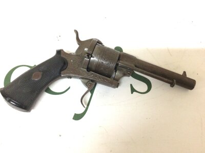 An Antique Continental 19th century pin fire revolver six shot. Steel action.