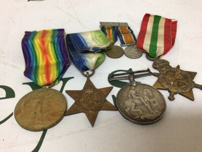 A collection of medals including Three I world war medals mixed recipients J 39605 EE Catchpole SIG BOY RN 1914/15 star also 15274 Pte CH Dobson 1st Royal Fusileers the other with no engraving a II world war Adlantic star and two Miniature I world war dress medals.