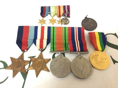 A Group of II world war medals 39-45 star and France German Star with retrospective Overlord medal and miniature dress medals